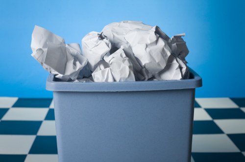Workers managing construction waste